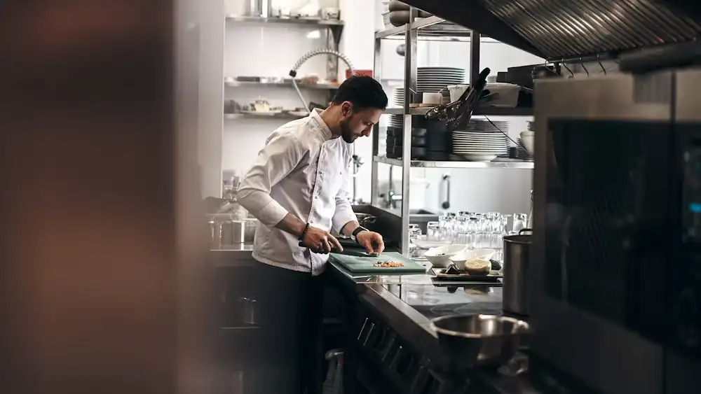 Chef working in a commercial restaurant kitchen